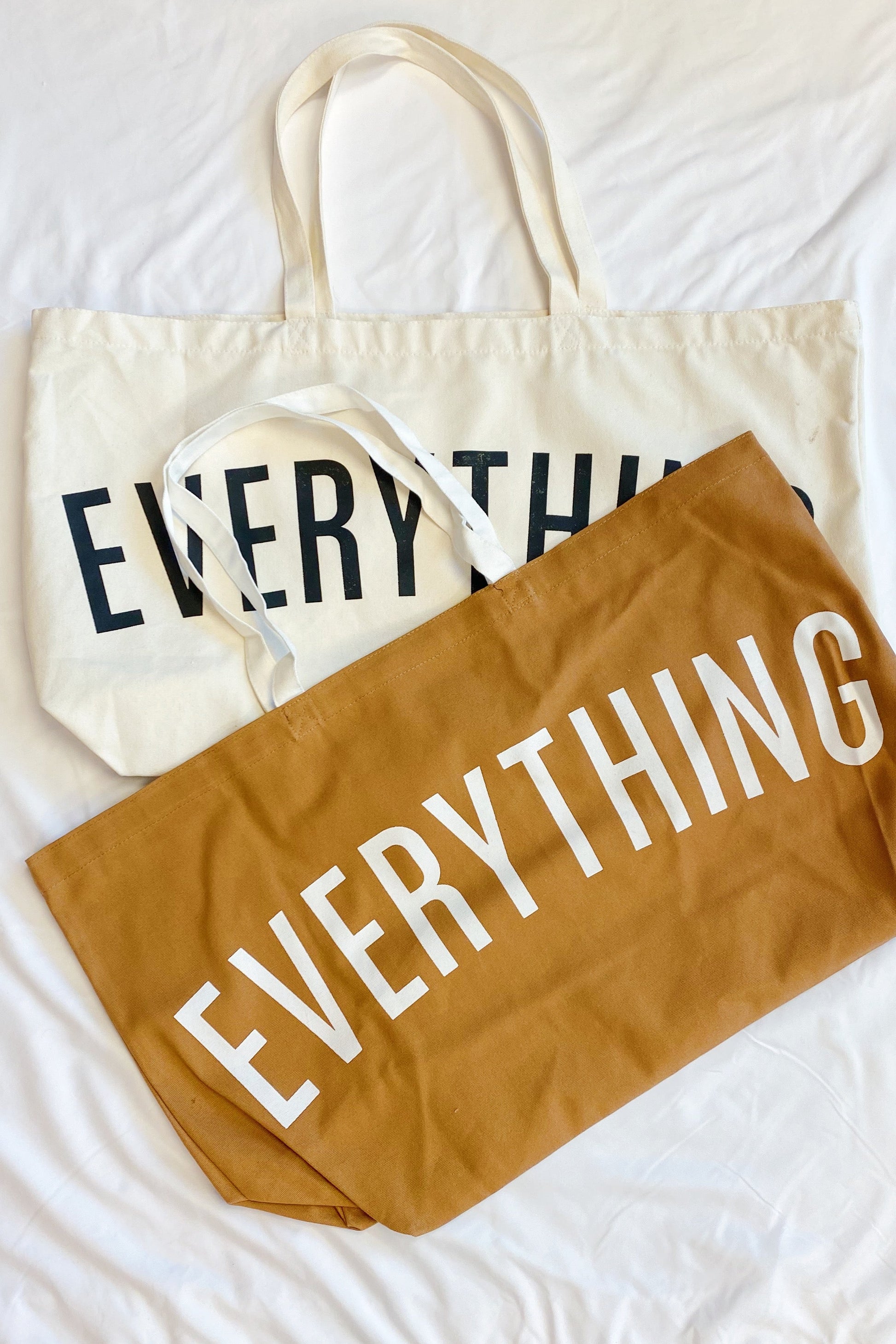 This tote can fit anything and everything! Made from great quality canvas material and detailed with a nice font "EVERYTHING".
Dimensions: approximately 26” x 7” x 15”